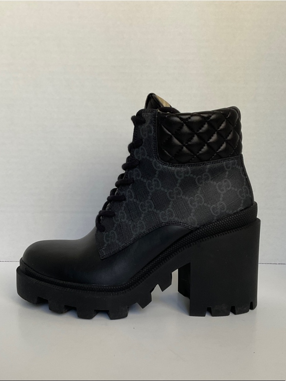 Gucci Black Leather Quilted Combat Boot with Tan Logo Tongue